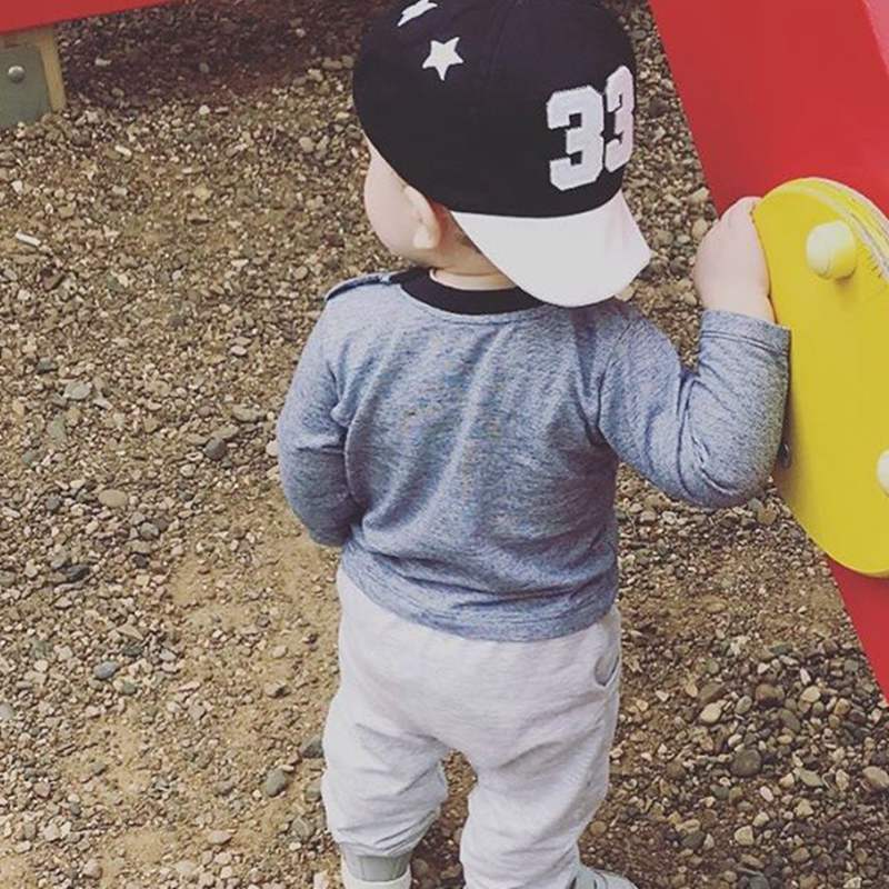 roltrap grind bijnaam Stoere zwart met witte baseball pet | 8-24 maanden - Busy Baby